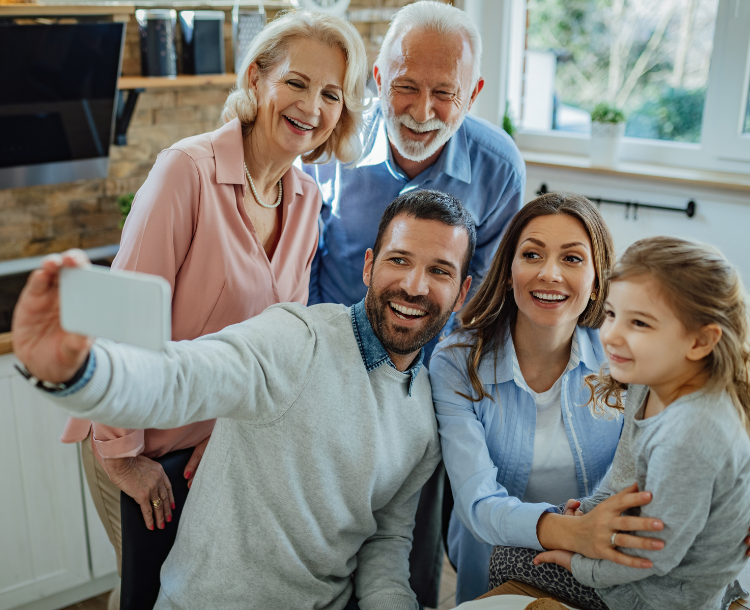Family members of different generations connecting through technology and shared traditions
