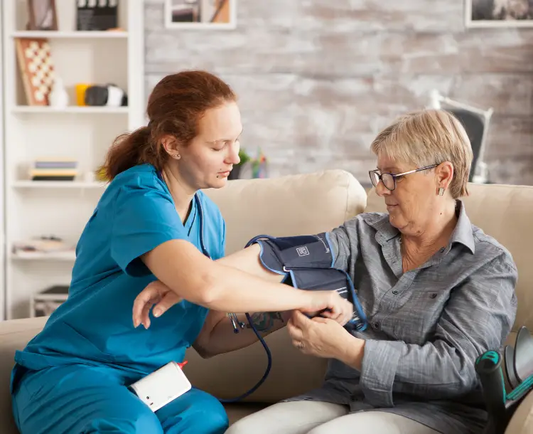 Elderly woman receiving chronic illness care as part of a comprehensive aging support ecosystem